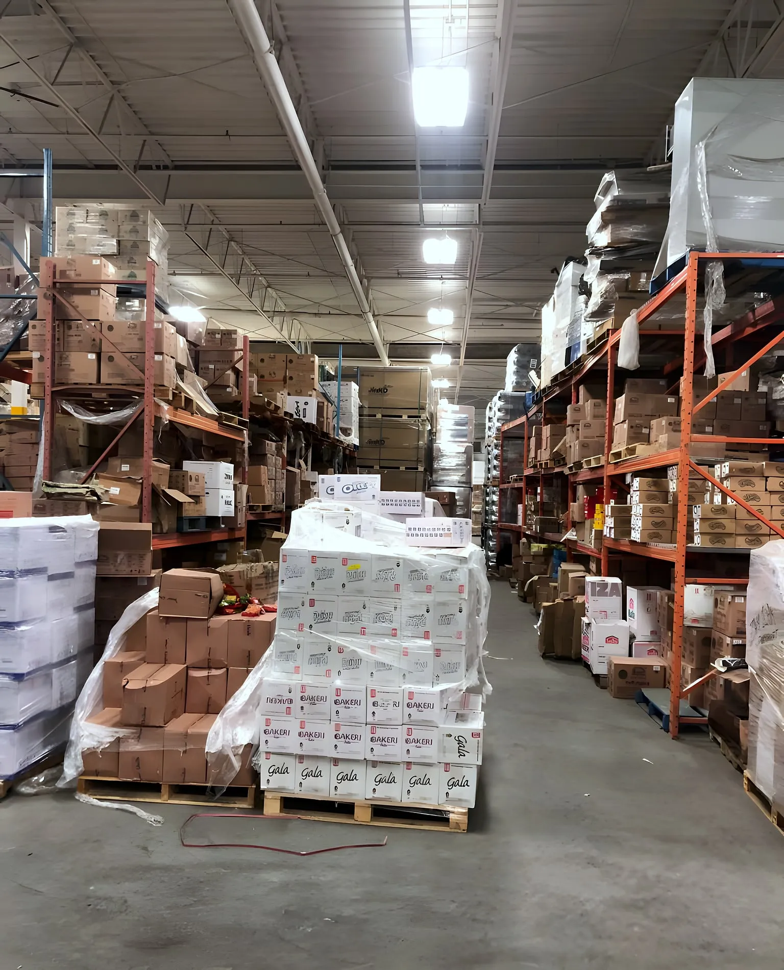 Racked aisles of stock in a Premium Foods warehouse